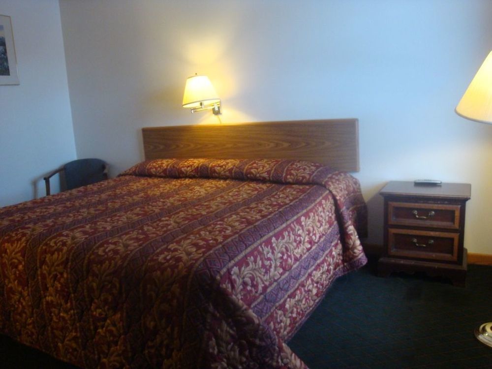 Currys Motel By Oyo Saginaw Mi Ruang foto